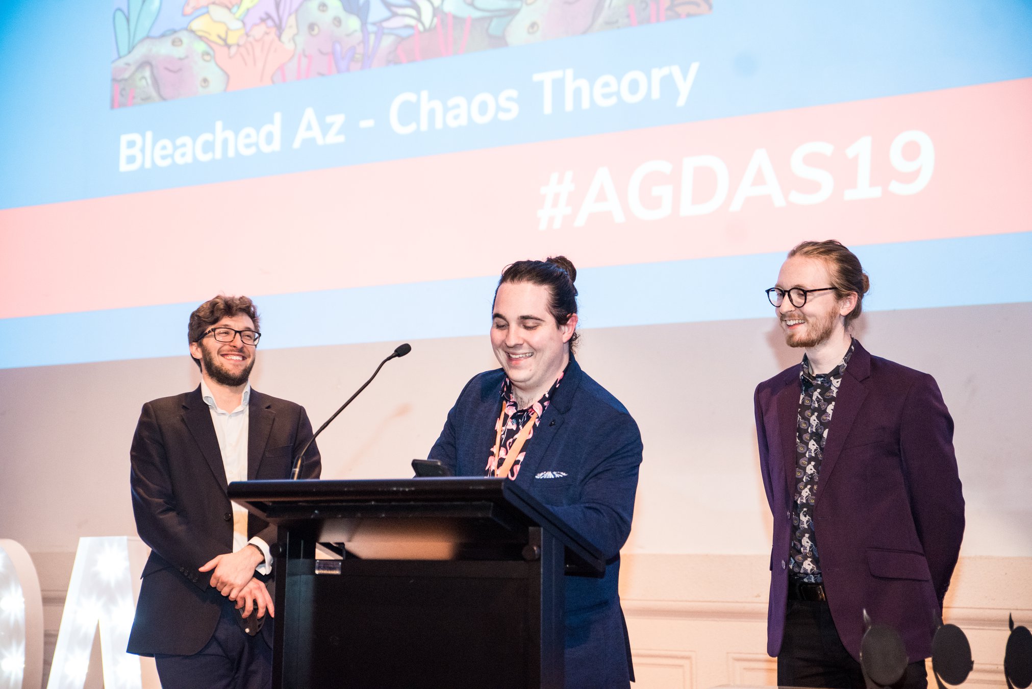 Chaos Theory's Executive Producer James Lockrey, Senior Producer Ryan Penning and Software Developer Rory Dungan accepting the Best Serious Game 2019 for Bleached Az at the Australian Game Developer Awards 2019 (AGDAs)