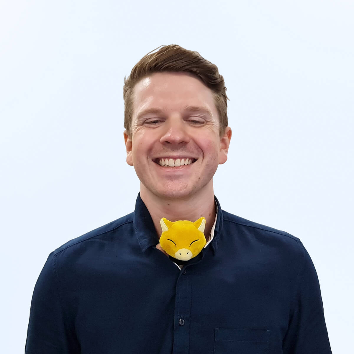 A headshot of an employee from Chaos Theory Games.