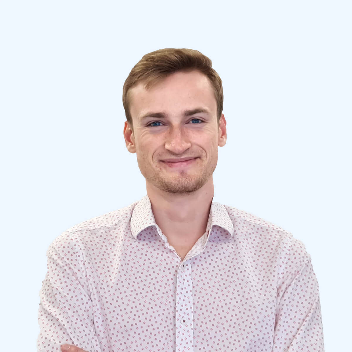 A headshot of an employee from Chaos Theory Games.