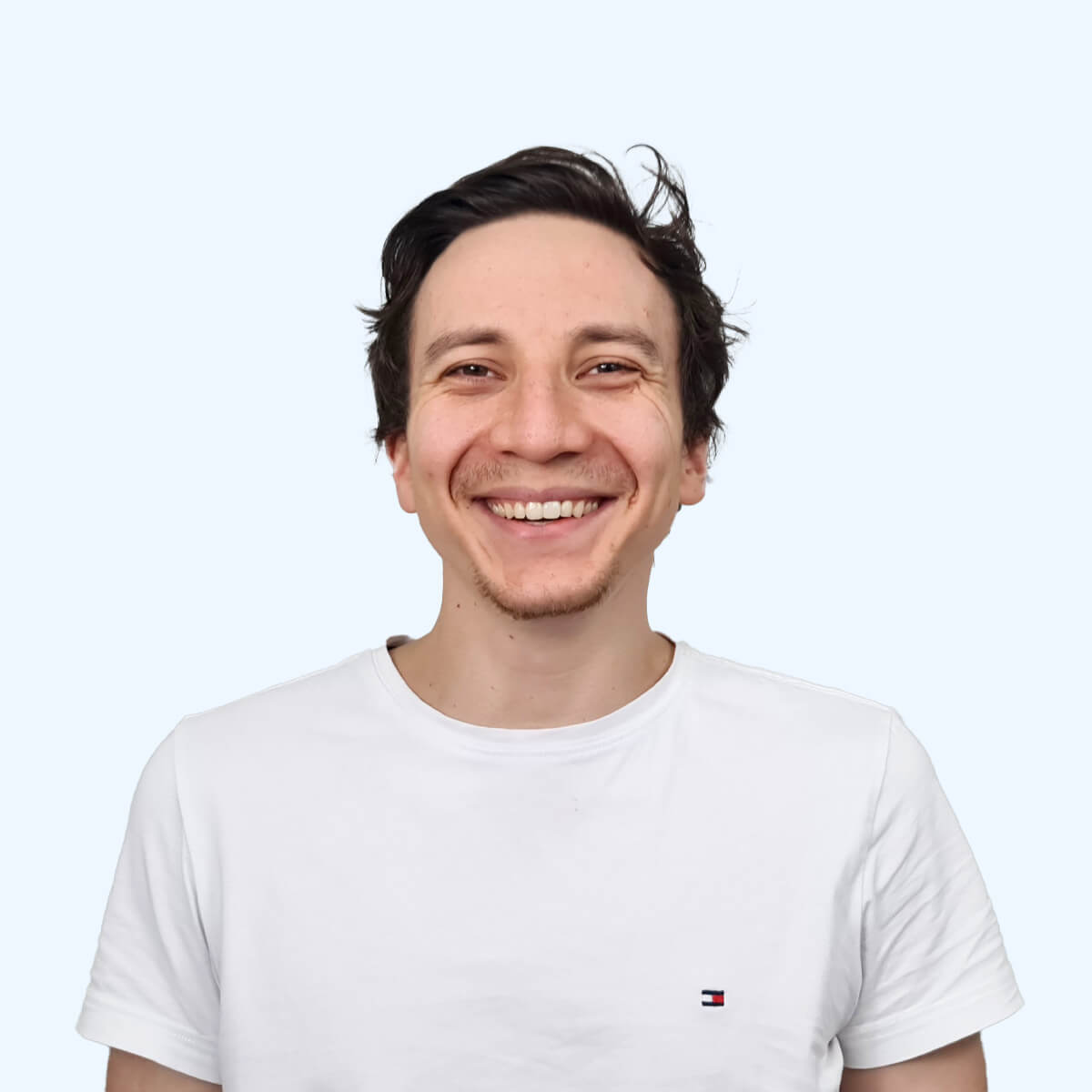 A headshot of an employee from Chaos Theory Games.