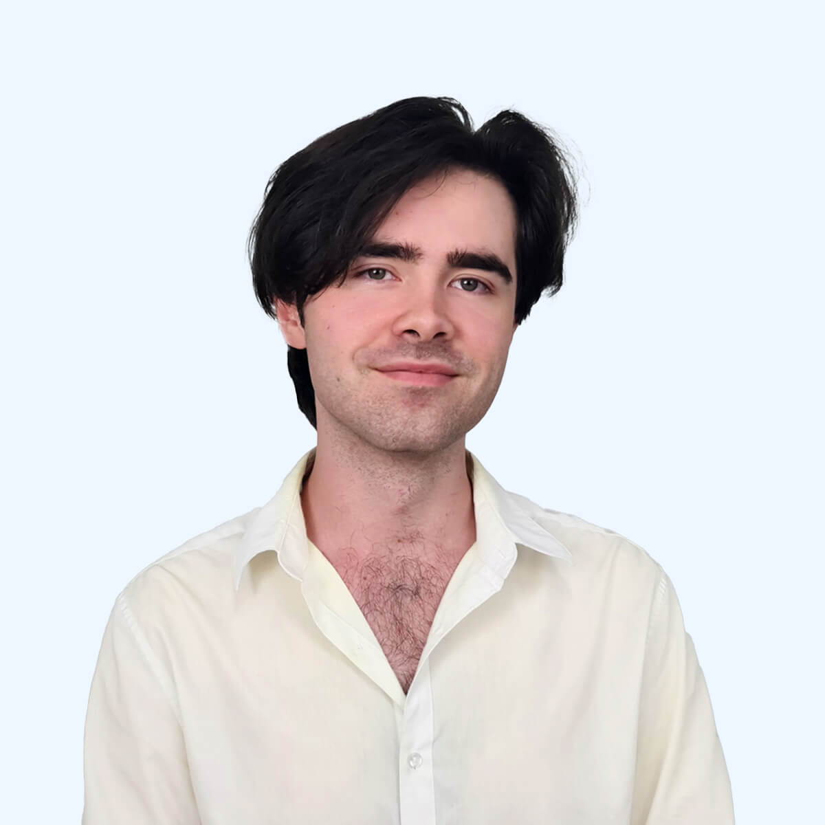 A headshot of an employee from Chaos Theory Games.