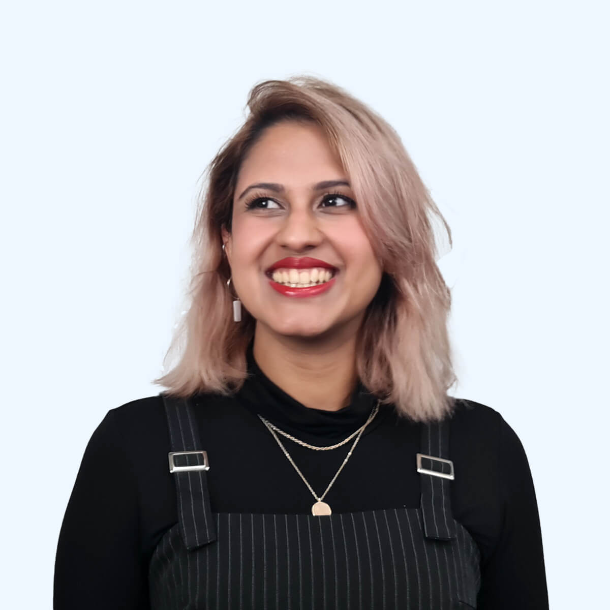 A headshot of an employee from Chaos Theory Games.