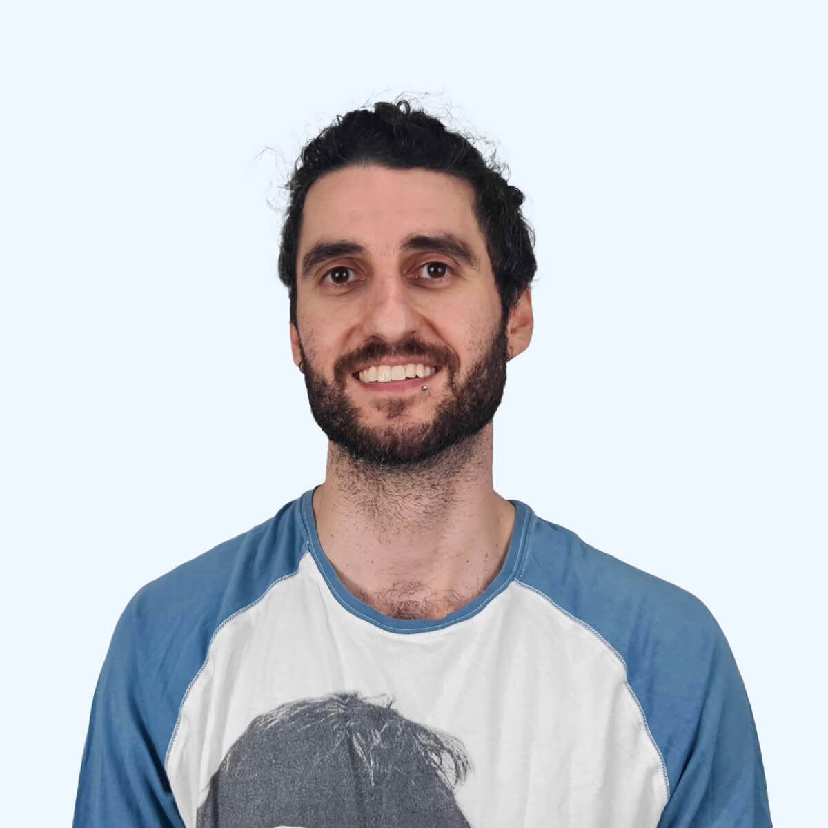 A headshot of an employee from Chaos Theory Games.