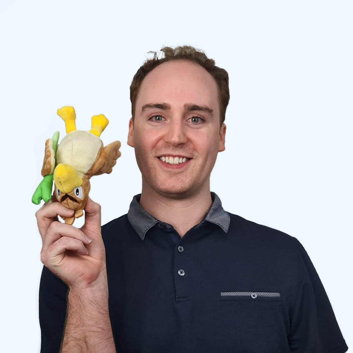 A headshot of an employee from Chaos Theory Games.