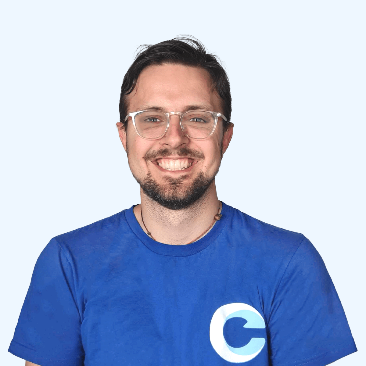 A headshot of an employee from Chaos Theory Games.